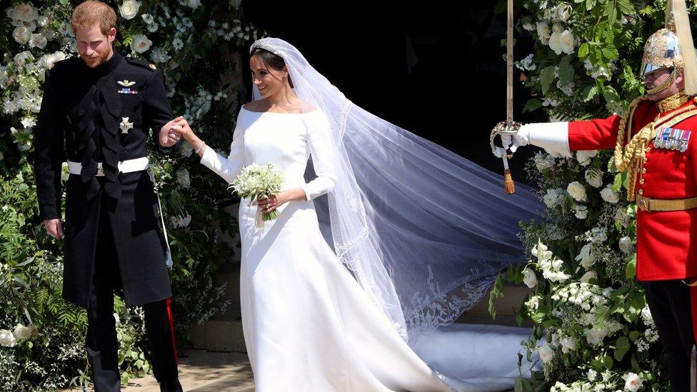 Prince Harry and Meghan Markle leave St George's Chapel in Windsor Castle after their wedding.