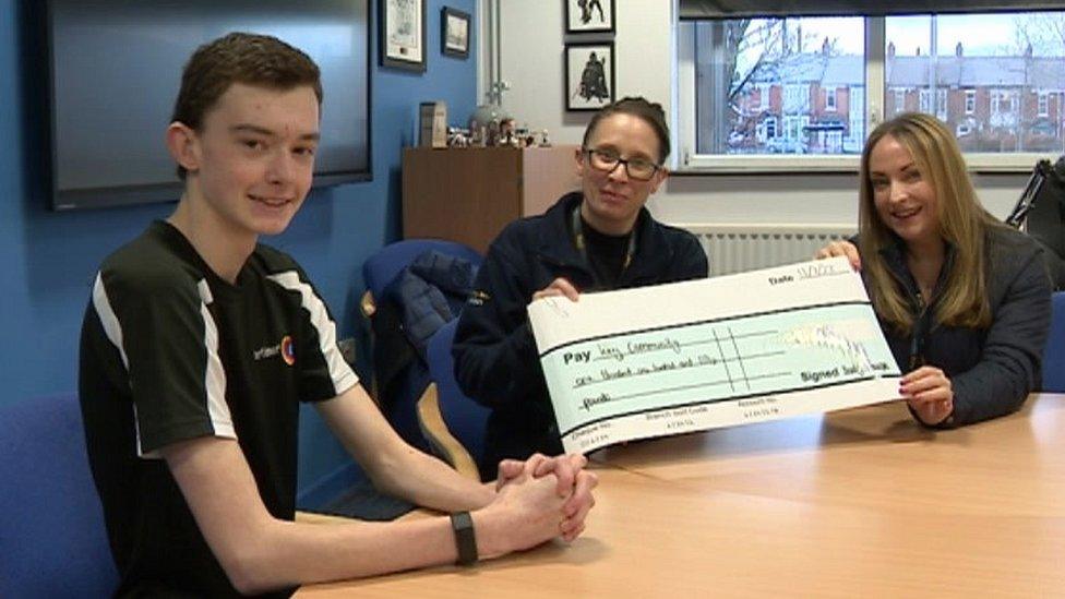 Bradley, presenting a cheque to Key to Life food bank team leader Marie Burnett (centre) and business development and communities manager Jo Benham Brown