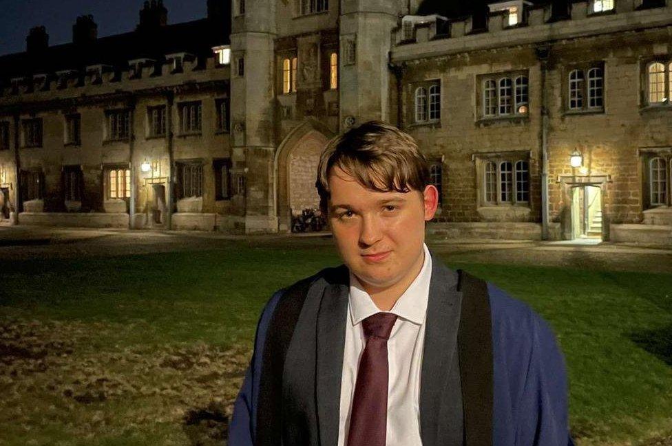 George in his robes outside the University of Cambridge