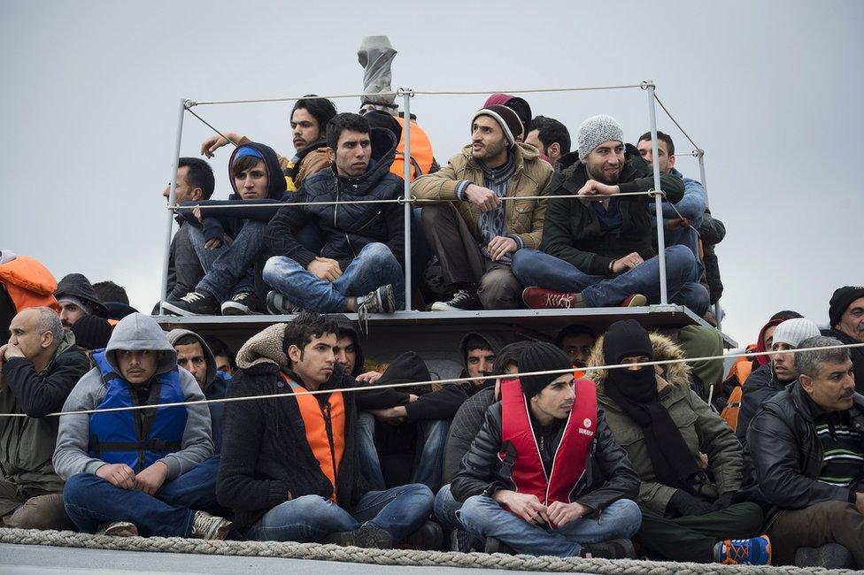 Migrants disembark at the port of Mytelene, Greece, 9 March