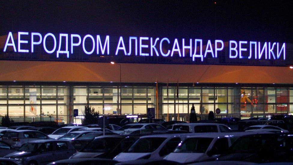 Cars are parked in front of the airport Alexander the Great in Skopje