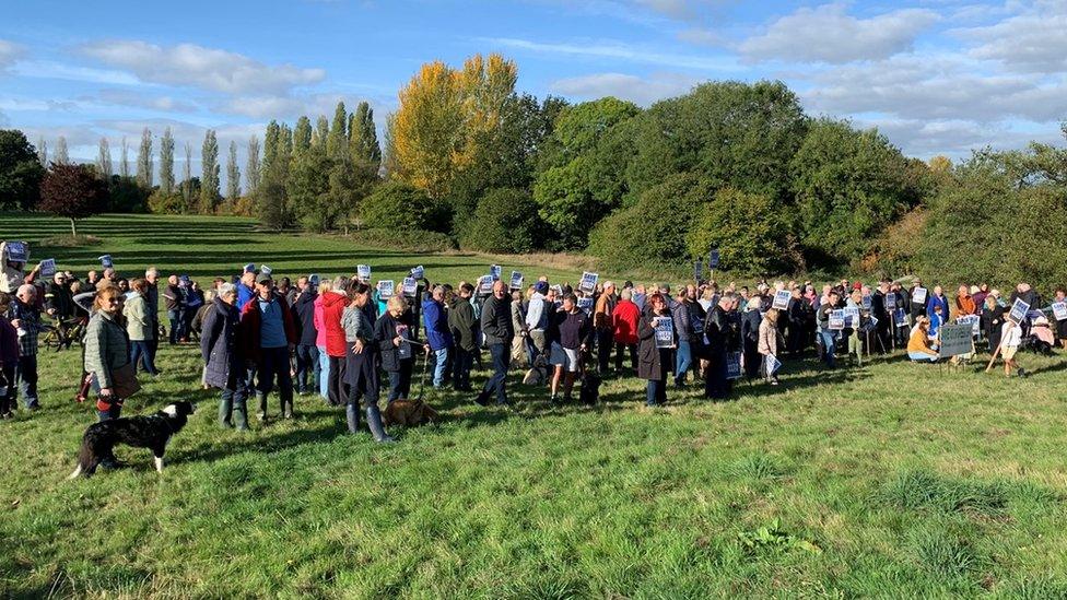 Image of campaigners on the former site