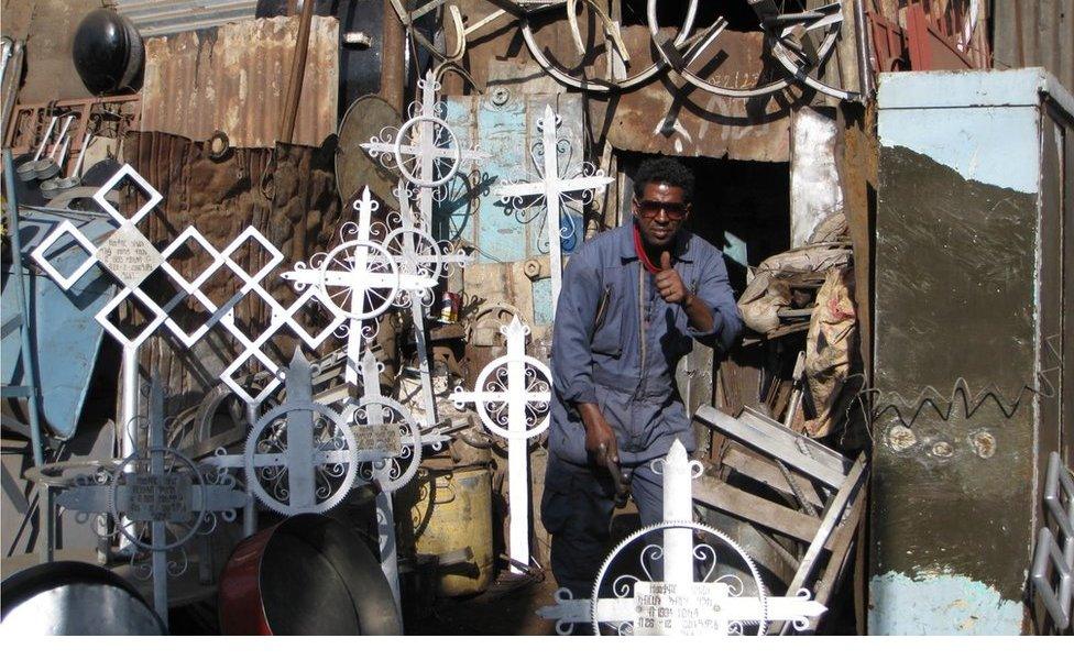 Stall selling crosses made from scraps of metal