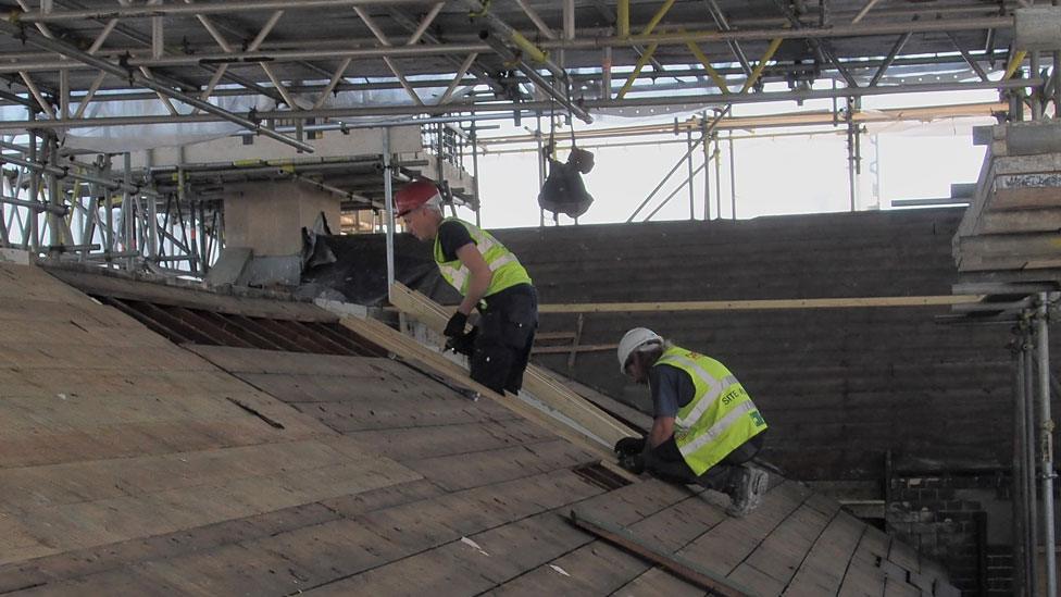 Workers on the roof of the old post office, Lowestoft