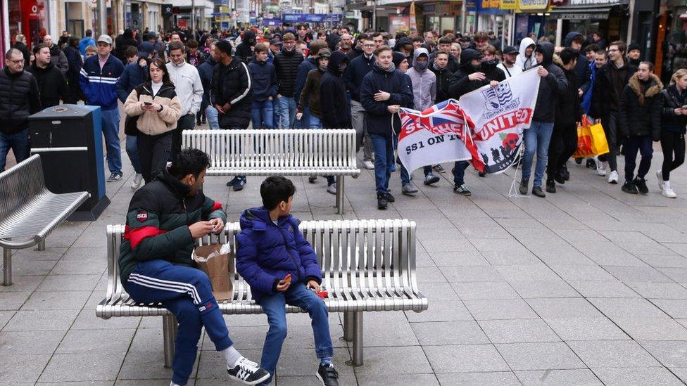 Southend United fans marching in the city high street