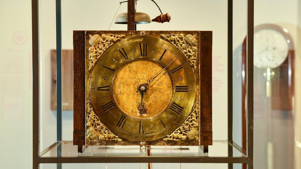 Early wooden longcase clock created in 1717