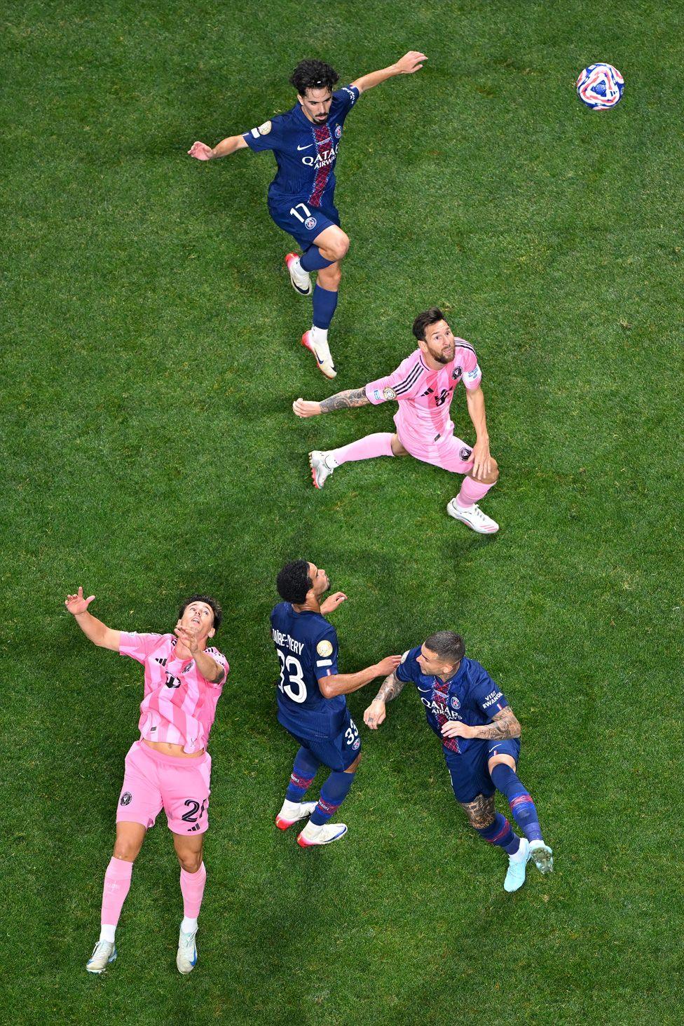 Warren Zaire-Emery, Vitinha, and Lucas Hernandez of Paris Saint-Germain battle for possession with Lionel Messi and Tadeo Allende of Inter Miami CF in Atlanta, Georgia. Photo by Shaun Botterill