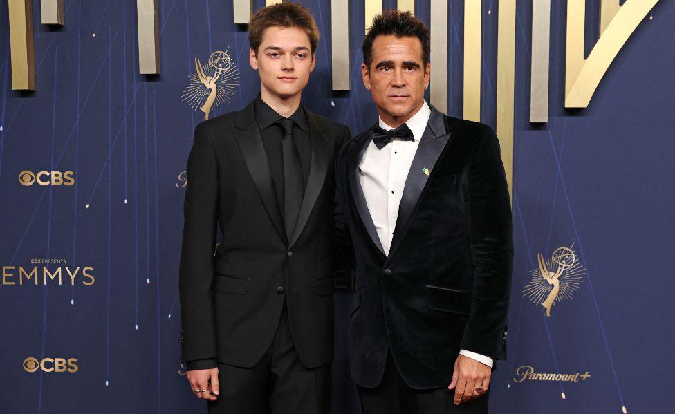 Irish actor Colin Farrell (R) and his son Henry Farrell arrive for the 77th Primetime Emmy Awards at the Peacock Theatre at LA Live in Los Angeles on September 14, 2025.