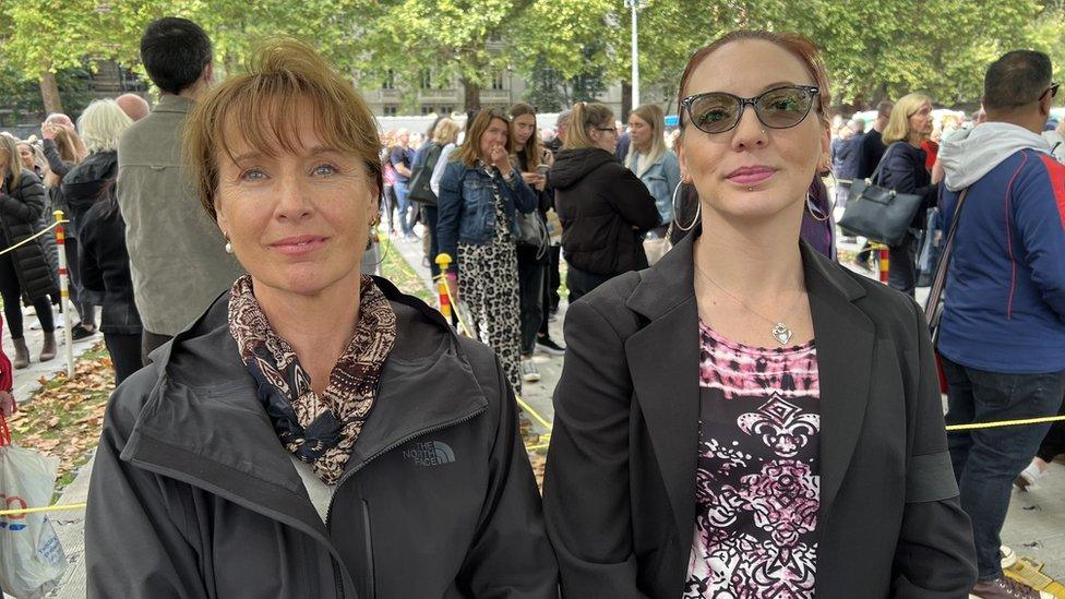 Two women from the South East queueing to see the Queen's coffin