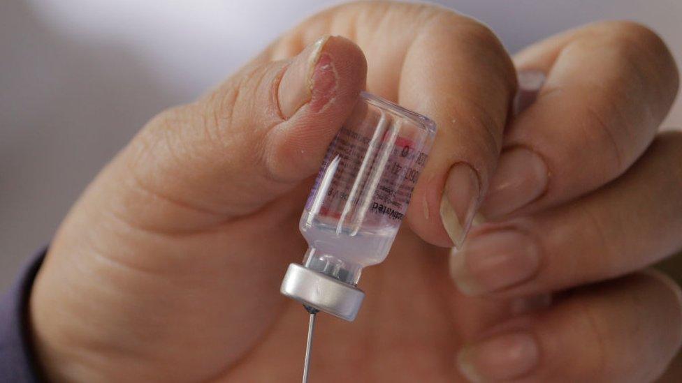 Medical personnel fill syringes with biological Sinovac in the esplanade of the Municipal Palace of Nezahualcóyotl, State of Mexico,