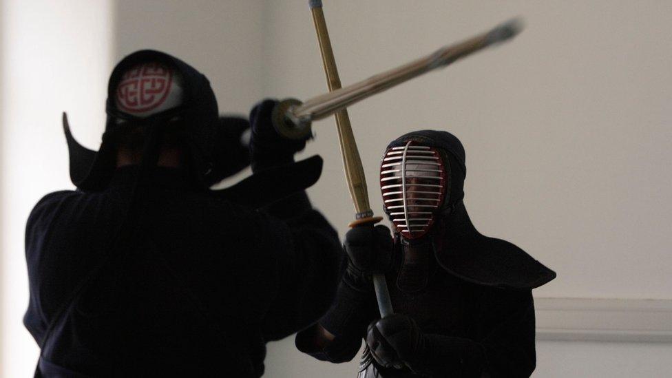 File photo of two people practising kendo