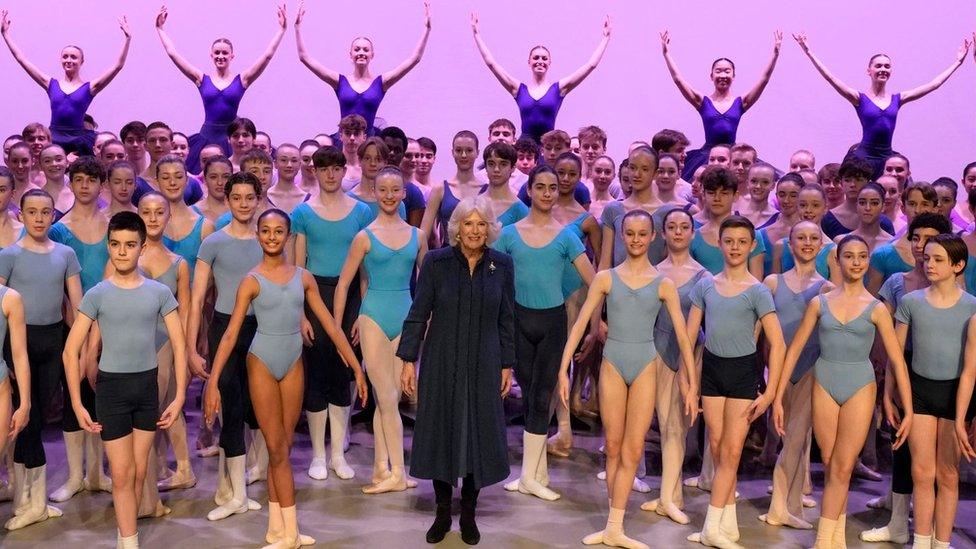 Camilla on stage in Birmingham with ballet students