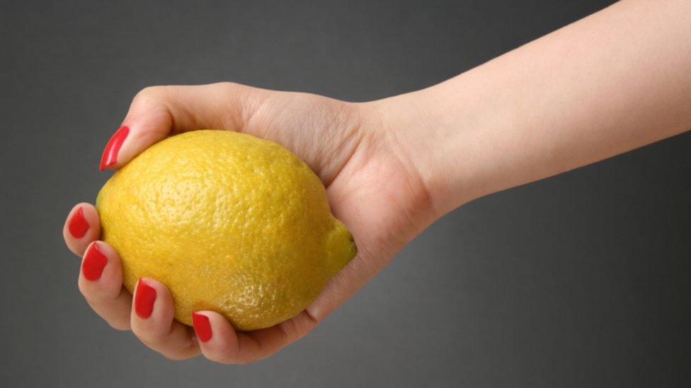 Lemon in hand