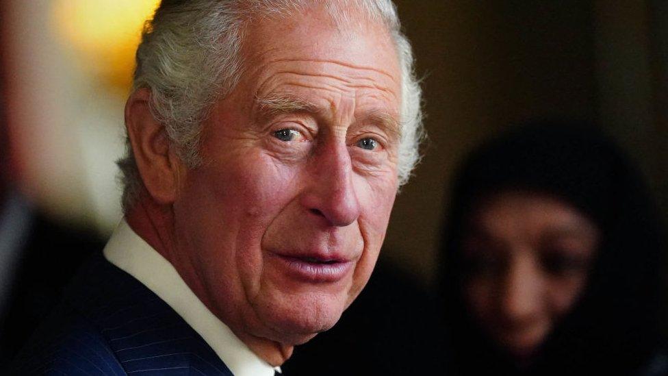 Close-up portrait shot of King Charles III during a reception with Realm High Commissioners and their spouses in the Bow Room of Buckingham Palace