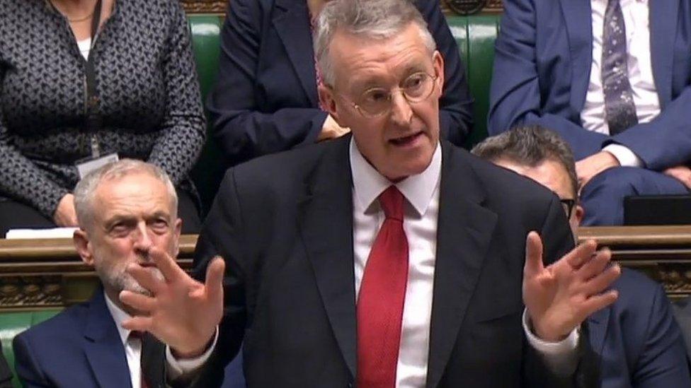 Hilary Benn with Jeremy Corbyn behind