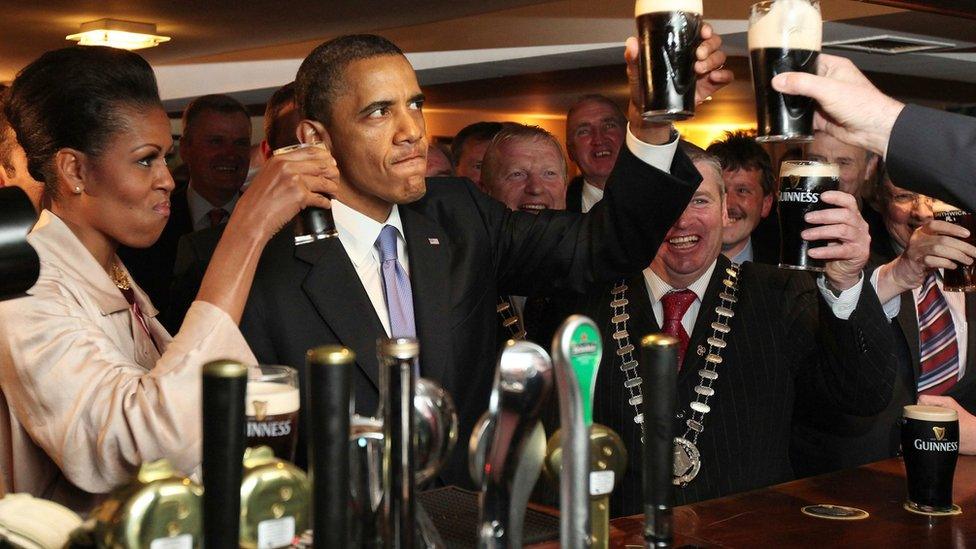 US President Barack Obama and First Lady Michelle Obama drink Guinness in Ireland in 2011