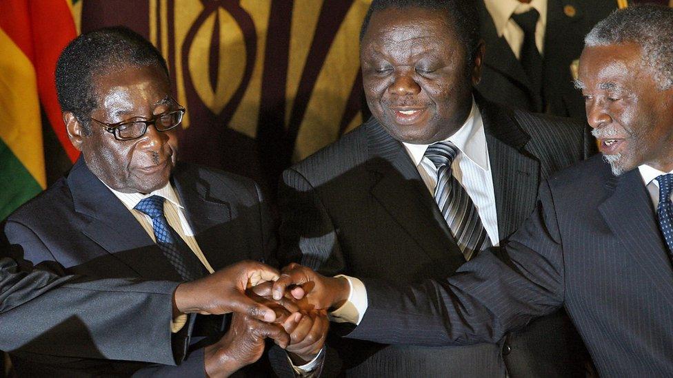 Zimbabwean leaders sign power-sharing deal