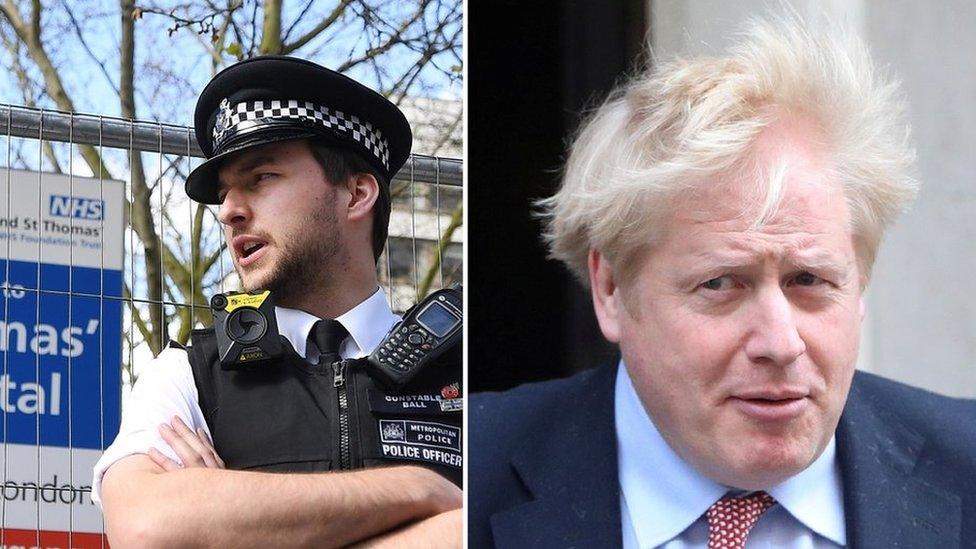 A police officer stands outside St Thomas Hospital, where Boris Johnson was admitted on Sunday