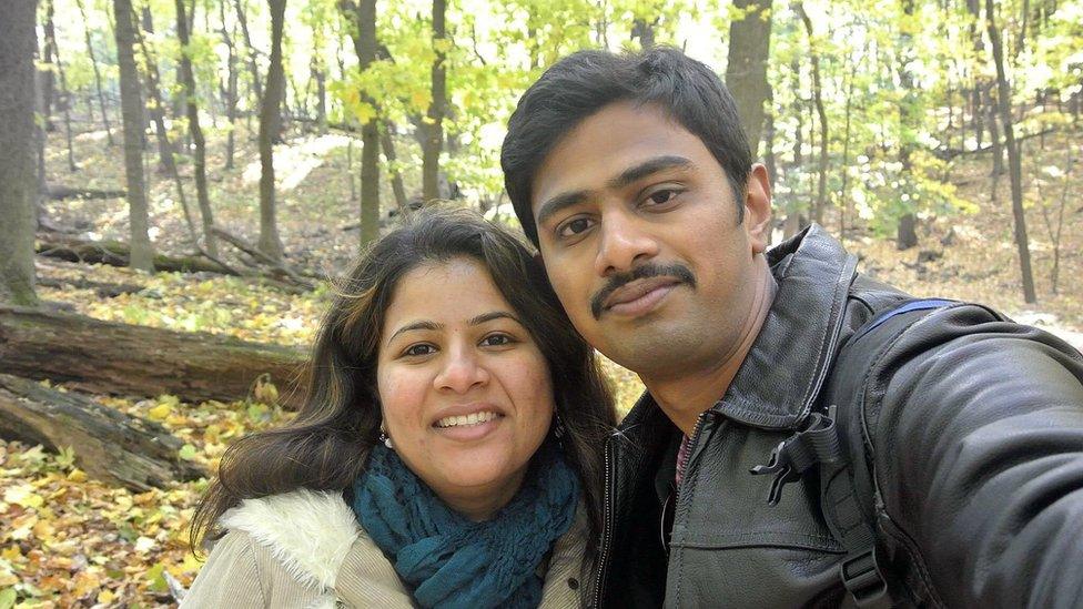 In this undated photo provided by Kranti Shalia, Srinivas Kuchibhotla, right, poses for photo with his wife Sunayana Dumala in Cedar Rapids, Iowa.