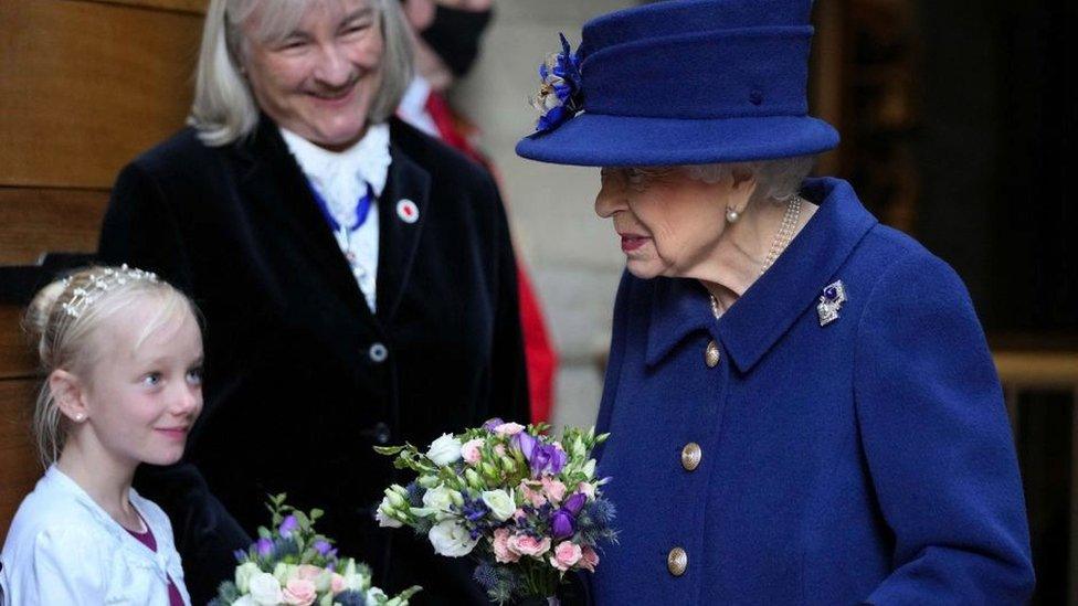 The Queen received flowers after the service