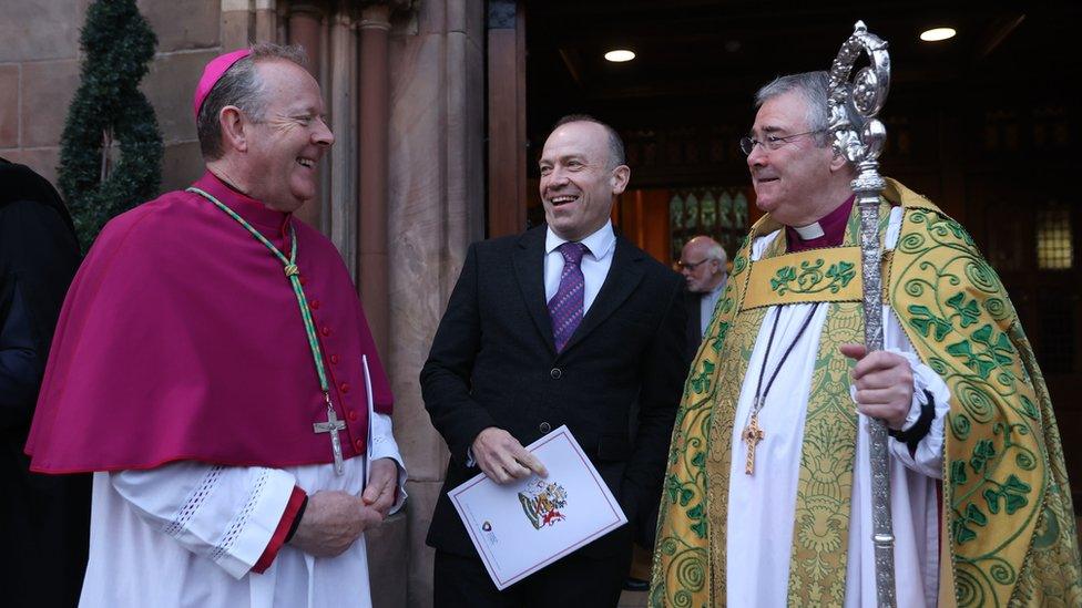 Archbishop Eamon Martin, Northern Ireland Secretary Chris Heaton-Harris and Archbishop John McDowell outside St Patrick's Cathedral