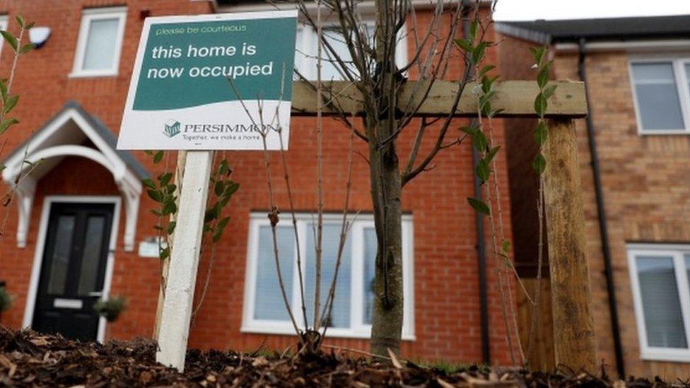 A sign outside a newly-built house (generic)