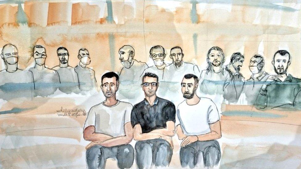 An artist's sketch shows Salah Abdeslam (R), and the other accused