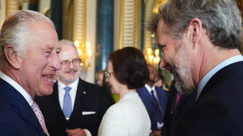 Charles III and Crown Prince Frederik at a Buckingham Palace reception before the King's Coronation last year