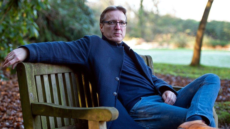 Arthur Brand sitting on a bench