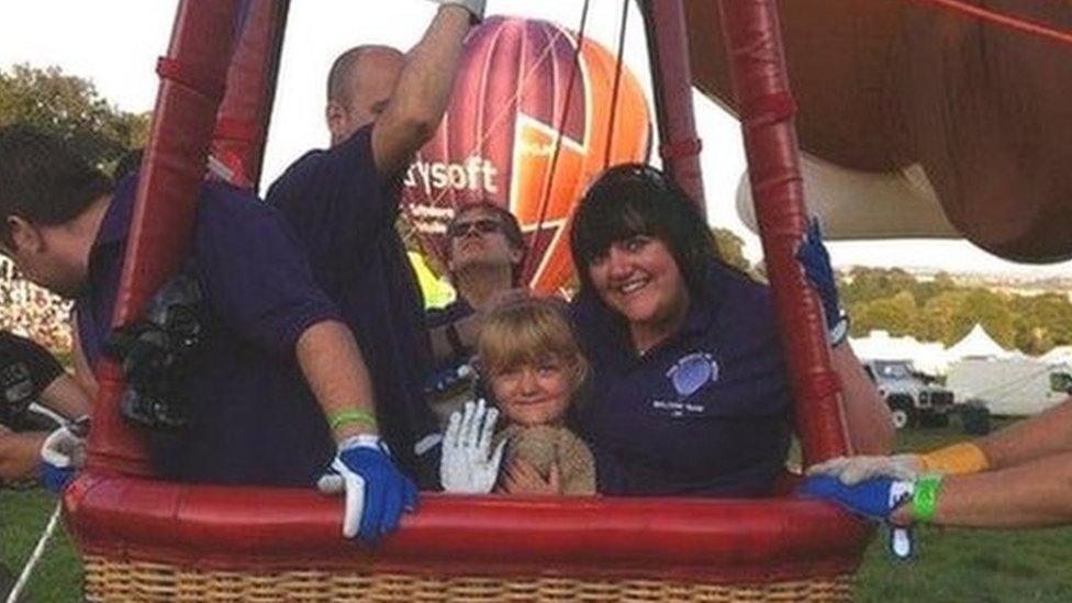 Alyssa Pitt and family in a hot air balloon basket