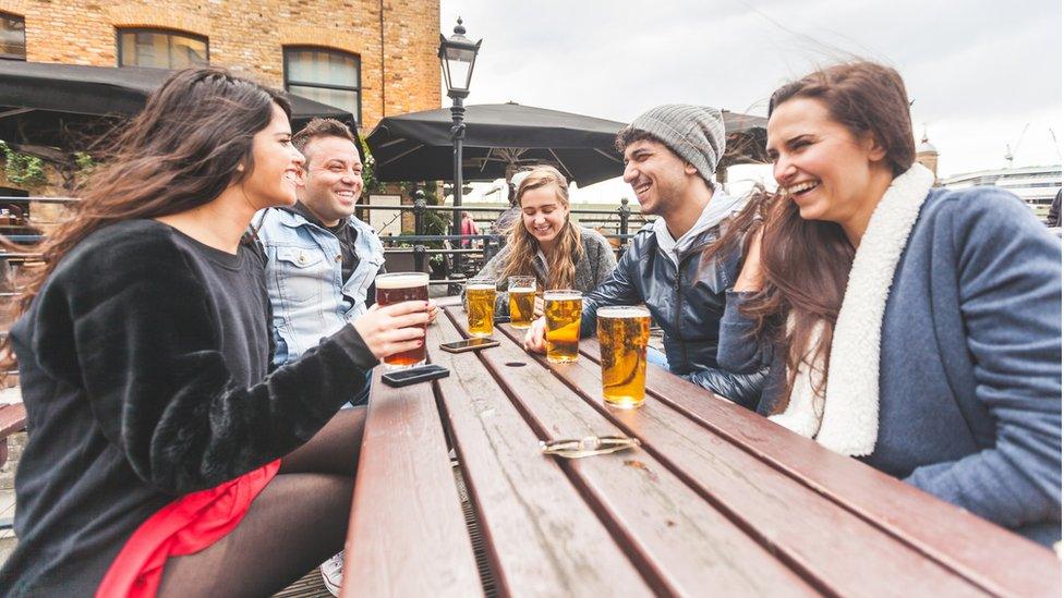 Drinkers outside pub