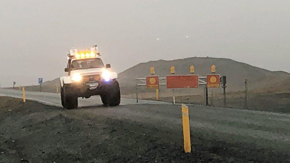 A police car blocking the road on Route 1 in Iceland