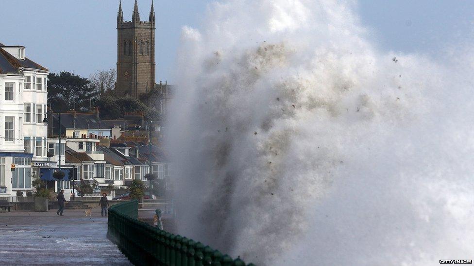 Waves crash onto Penzance seafront in Cornwall