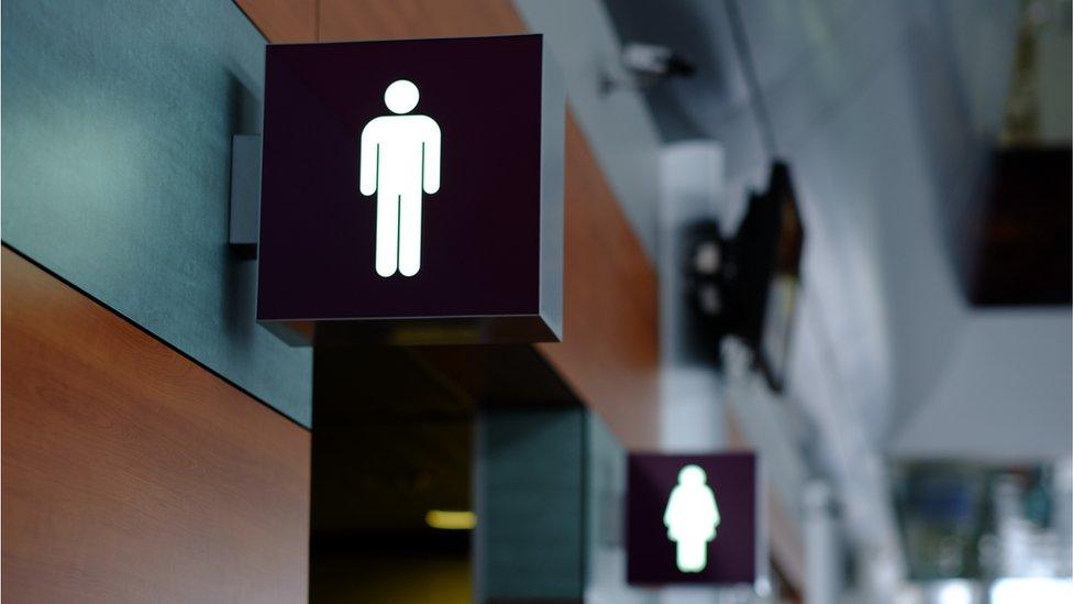 Men's and women's toilet signs