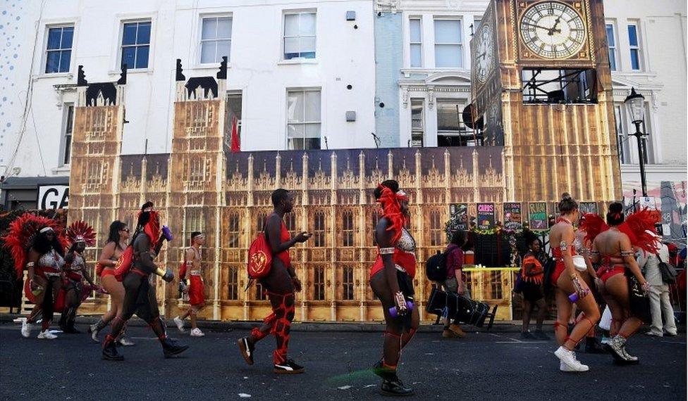 Performers walking past sound system