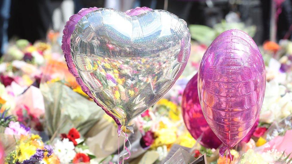 Balloons and flowers left in St Ann's Square, Manchester