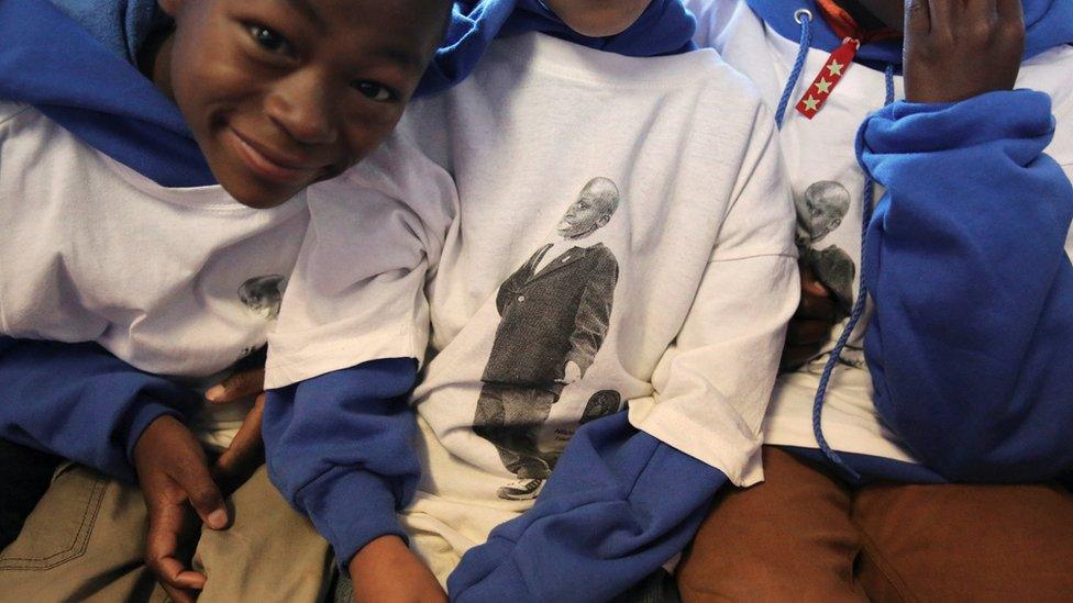 Children smile for the camera ahead of AIDS2016 event in South Africa