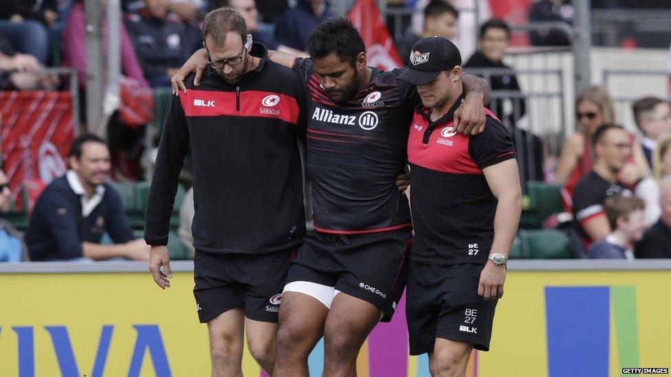 Picture of Billy Vunipola being carried off by physios