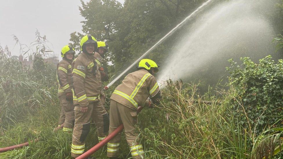 Fire crews tackling the flooding in Long Melford