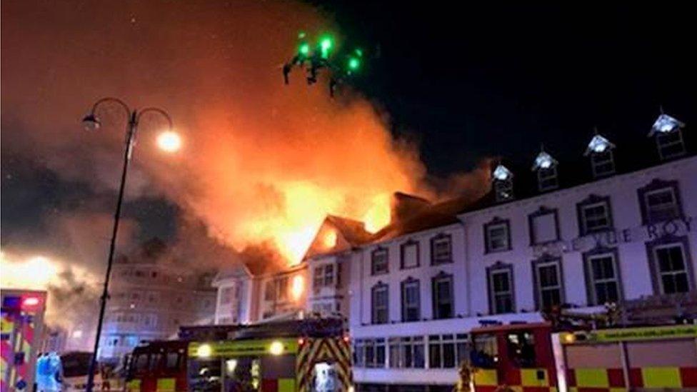 Drone flying over the burning hotel