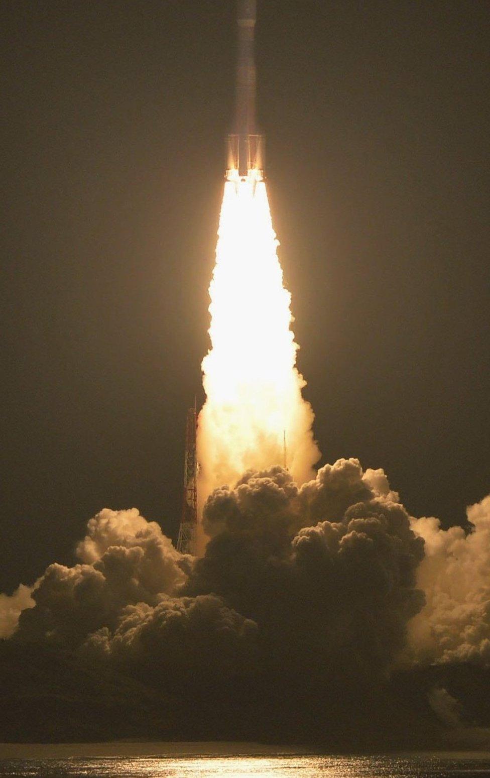 Japan's H-IIB rocket with a capsule called Kounotori, or Stork, goes up shortly after lift-off at the Tanegashima Space Center in Tanegashima, southern Japan, Friday evening, 9 December 2016.