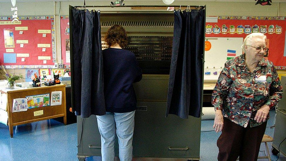 A woman votes in Pennsylvania.