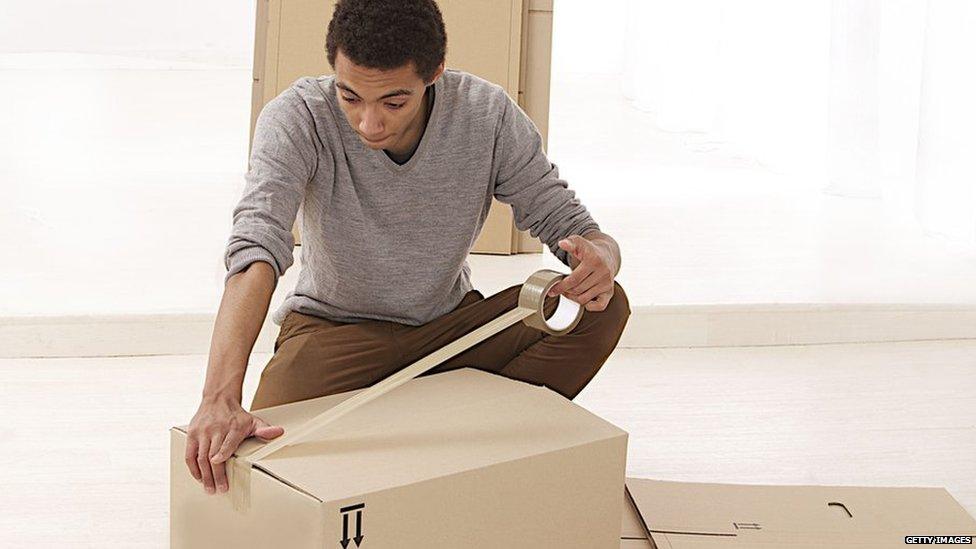 Man packing a box