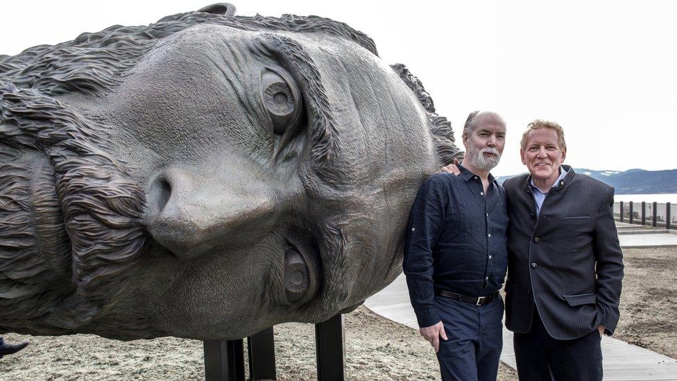 Artist Douglas Coupland (left) and Proprietor Anthony von Mandl (right) stand alongside the bronze ‘Vincent’ sculpture at Martin’s Lane Winery