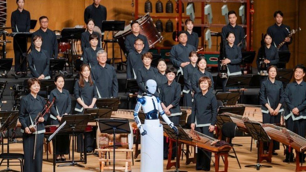 Robot with the orchestra