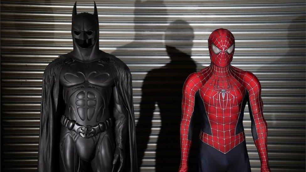 Batman and Spider-Man suits