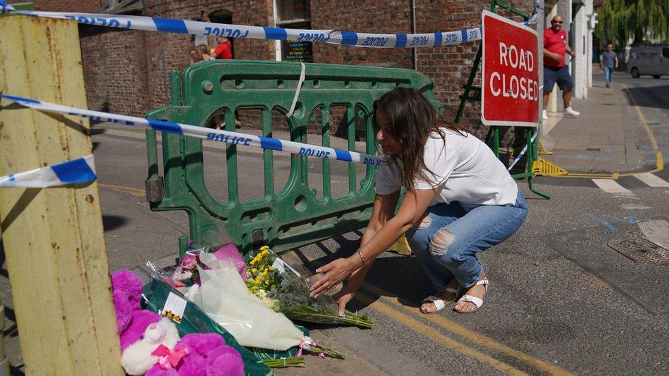 Flowers being laid