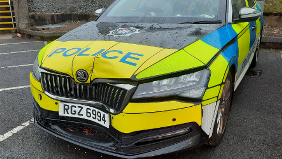 Damaged police car