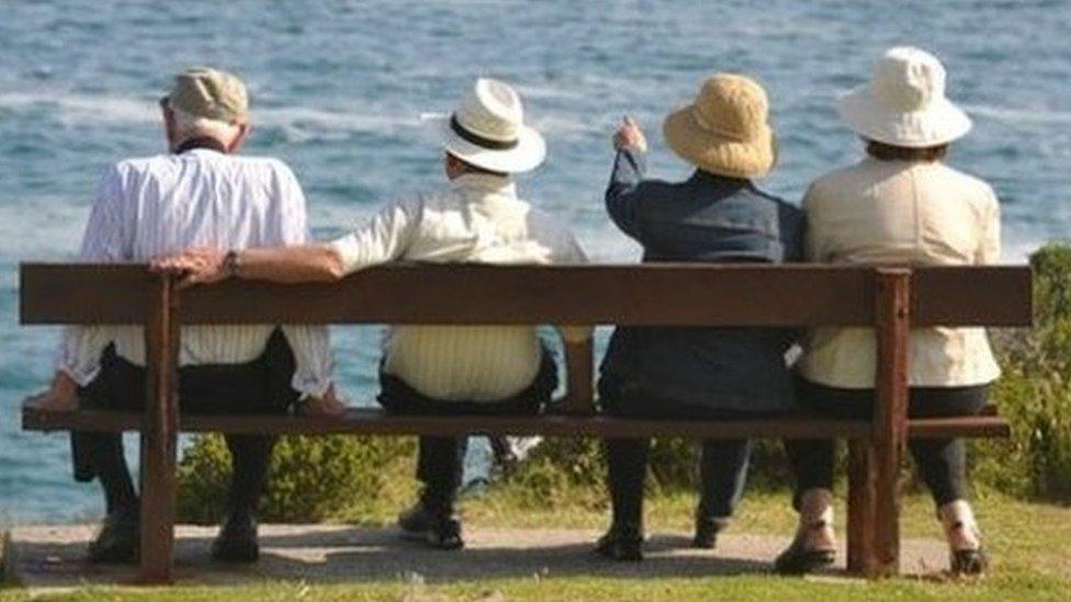 People sitting on a bench