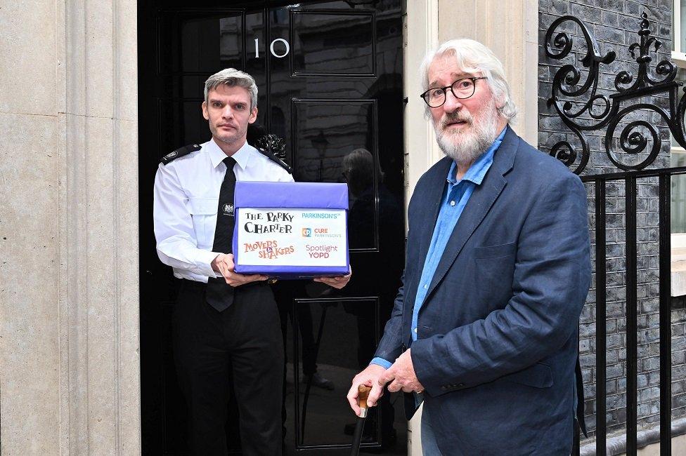 Jeremy Paxman presenting the Parky Charter at No 10